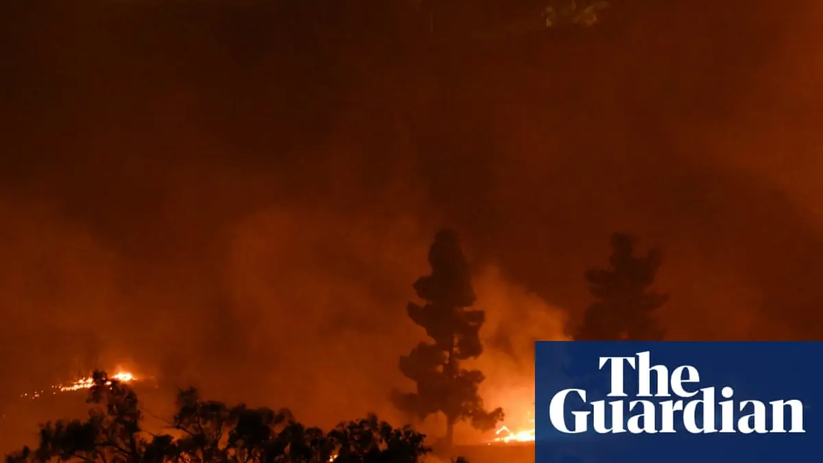 Brush fires set homes ablaze in southern California as it braces for more hot weather