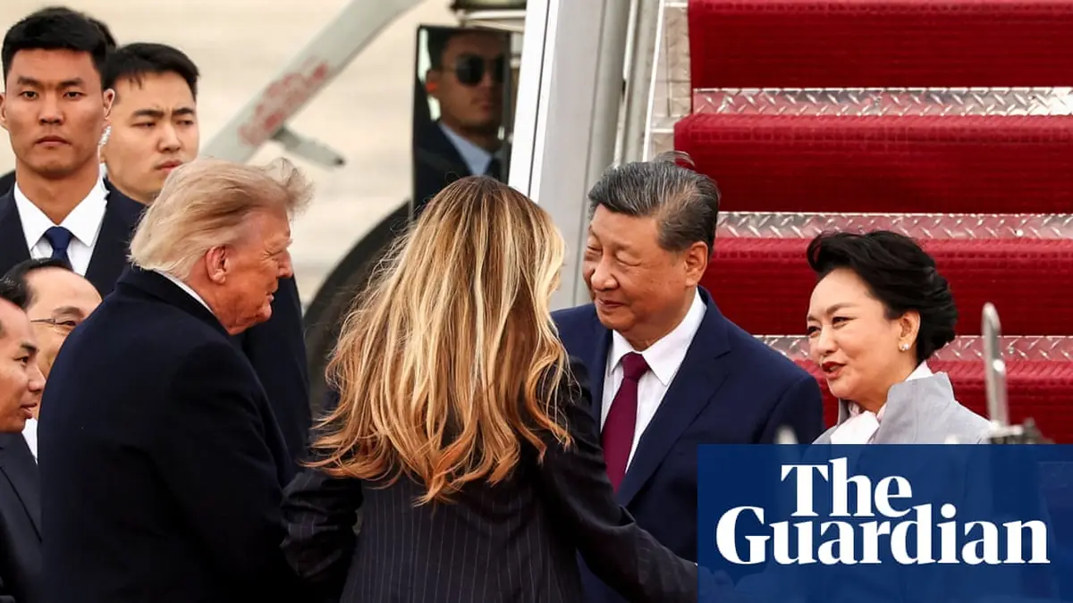 Trump greets Xi Jinping on arrival in rare move as US-China trade truce extended